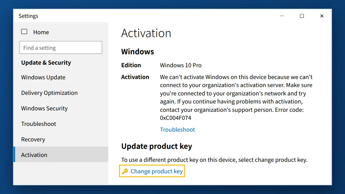 Windows 10 Settings Activation page showing error 0xC004F074 with Change product key link
