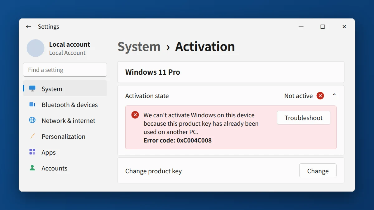 Windows 11 Settings Activation page showing error 0xC004C008, product key already used on another PC