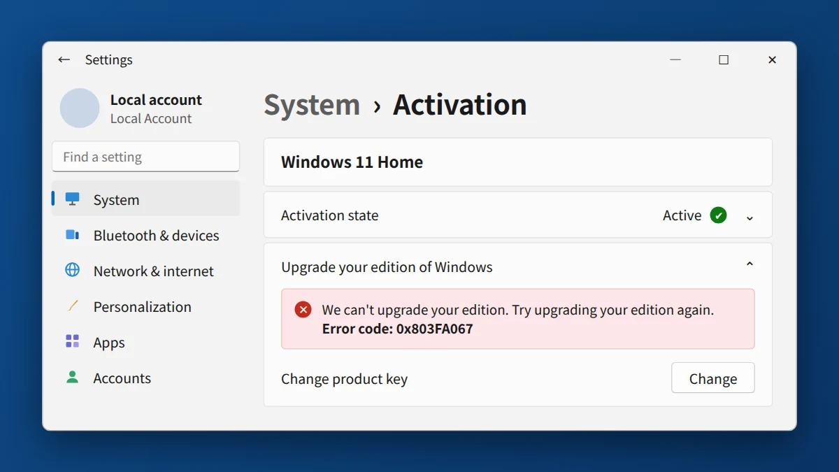 Windows 11 Home Activation page showing We can't upgrade your edition error 0x803FA067
